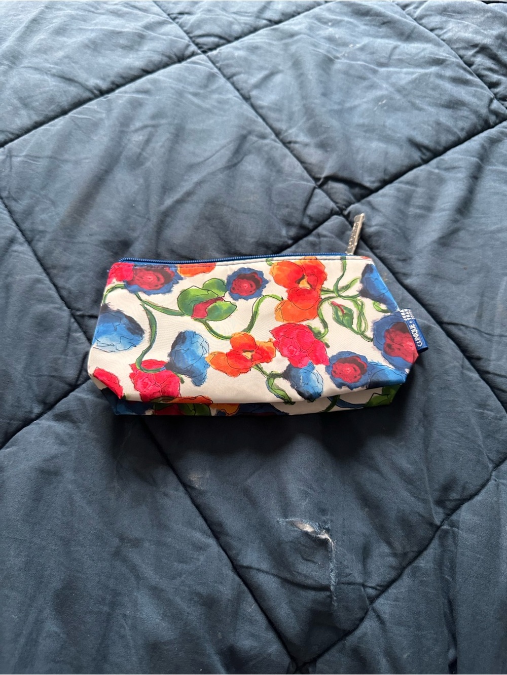 Clinique Floral Canvas Cosmetic Pouch in White, Red, Blue, Green, Orange